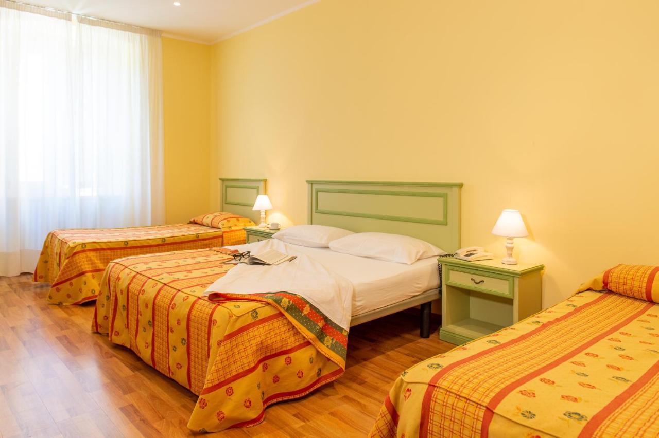 Hotel Minerva Ассизи Экстерьер фото